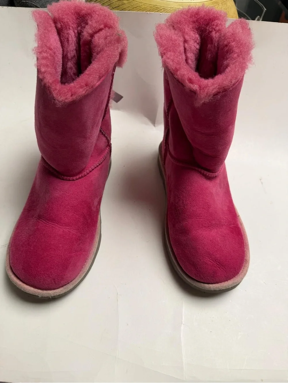 UGG Kids Fuchsia Suede Shearling Boots. They are a bit dirty on the back.